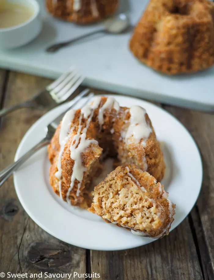 Mini Apple Spice Bundt Cake with piece cut off. 