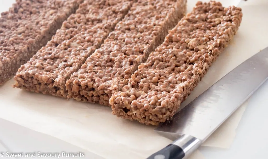 Cocoa Quinoa Puffs and Peanut Butter Squares on cutting board.