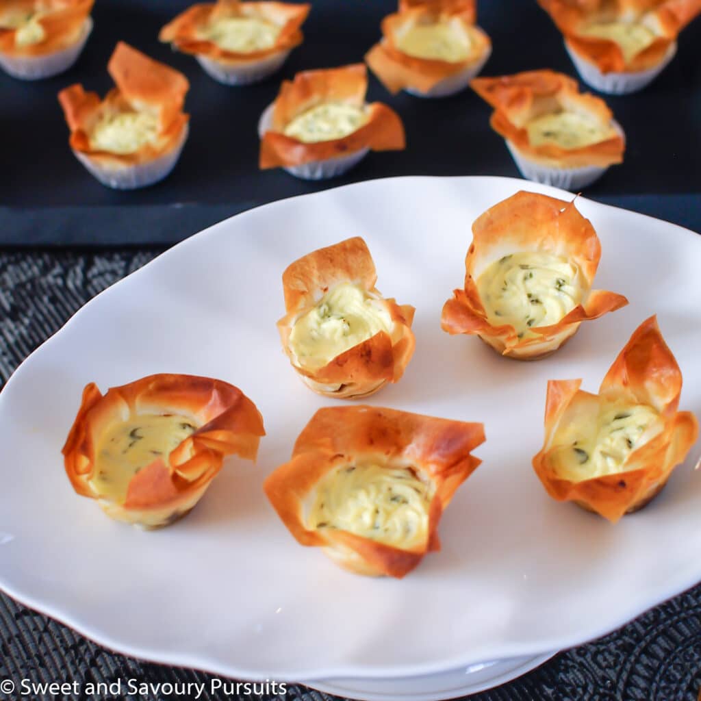 Caramelized Onion and Goat Cheese Phyllo Tartelettes on dish.