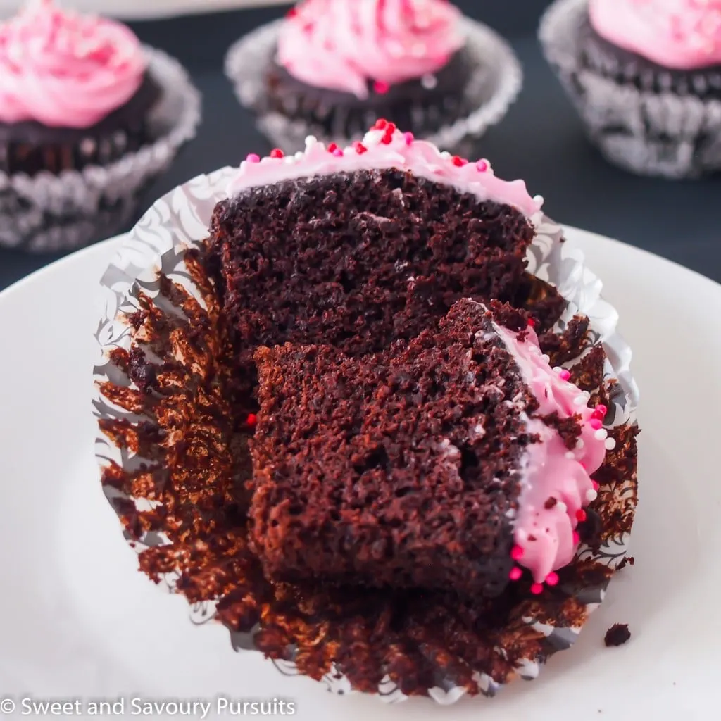 Chocolate beet cupcake cut in half.