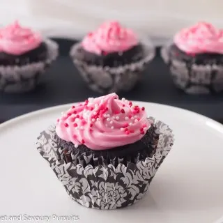 Chocolate Beet Cupcakes with Cream Cheese Icing on cake stand.