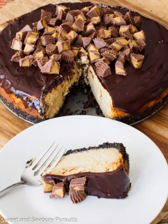 Slice of Peanut Butter and Chocolate Cheesecake on dish.