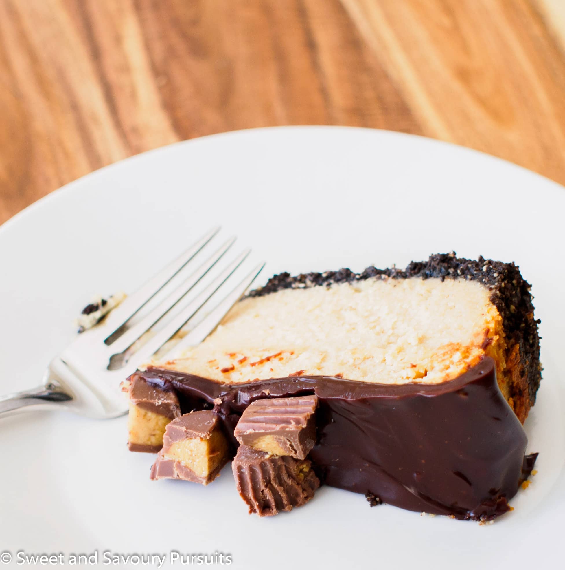 Slice of peanut butter and chocolate cheesecake.