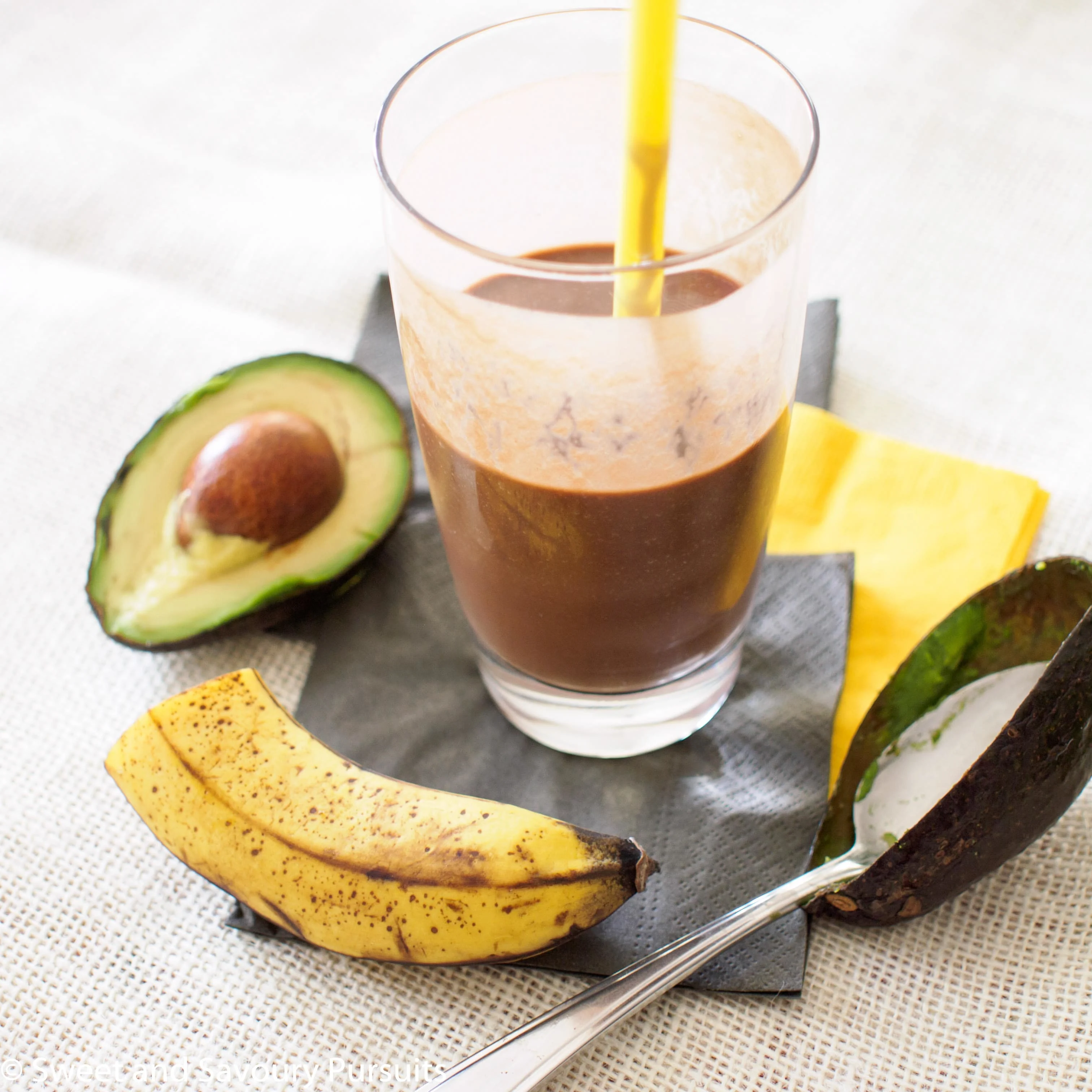 Avocado and Chocolate Smoothie in a tall glass.