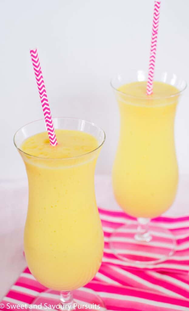 Two Pineapple Mango Smoothies.