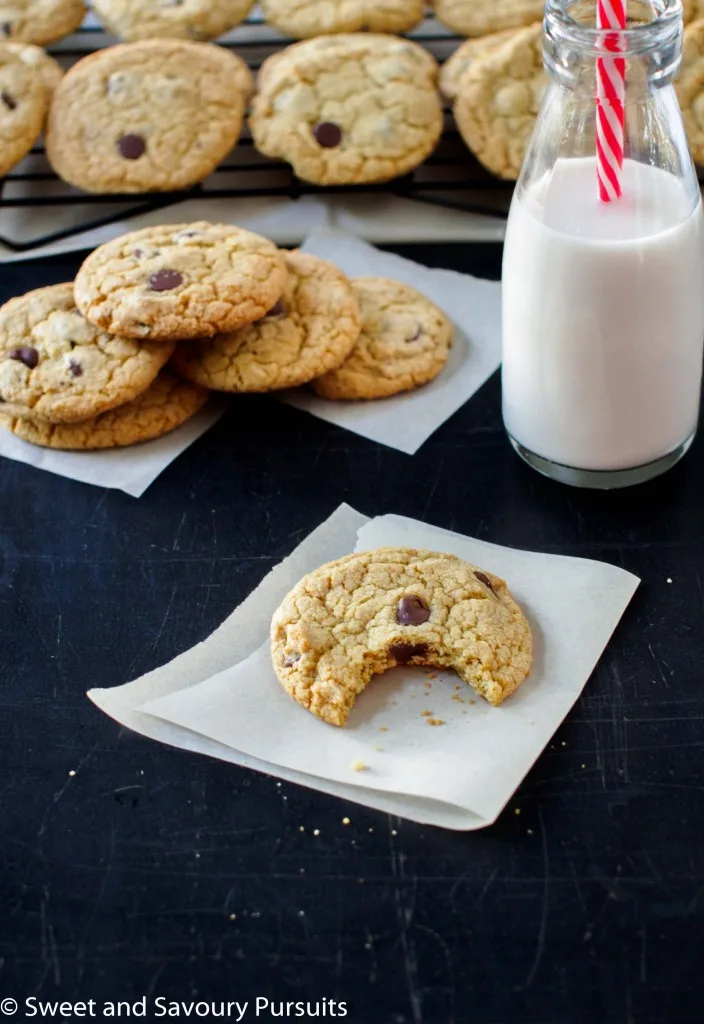 Quinoa Chocolate Chip Cookies served with a small bottle of milk.