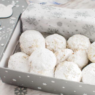 Box of powdered sugar almond cookies.