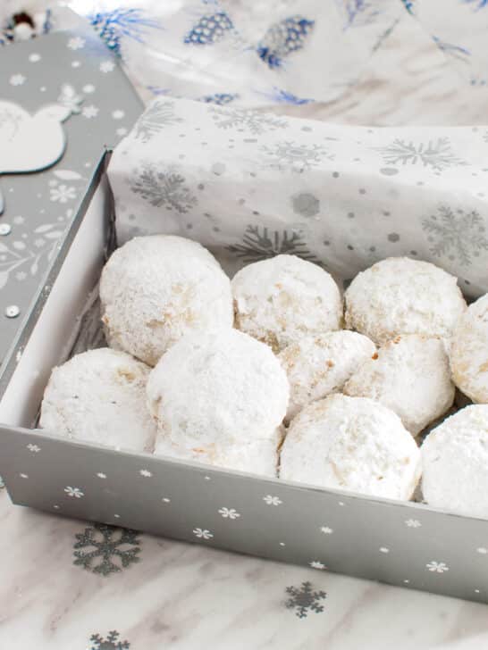 Box of powdered sugar almond cookies.