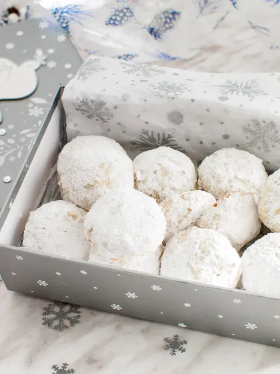 Box of powdered sugar almond cookies.