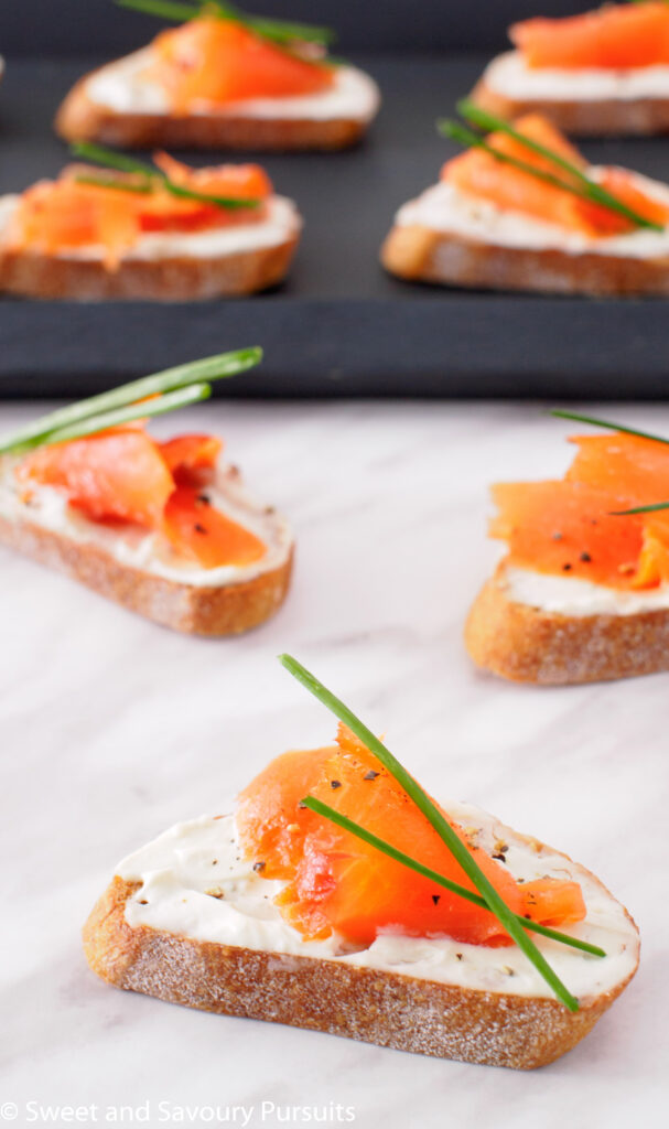 Smoked Salmon and Boursin Crostini with fresh chives.