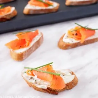 Crostini topped with Boursin cheese and smoked salmon.
