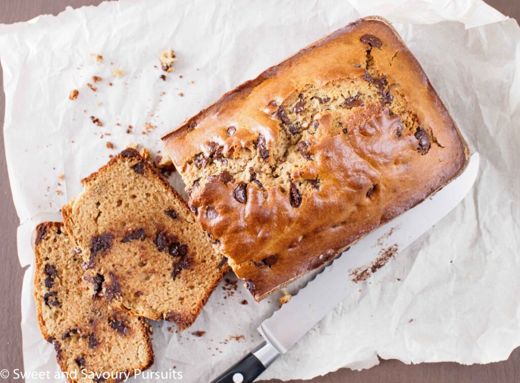 Top view of a Peanut Butter and Chocolate Chip Loaf on a cutting board.