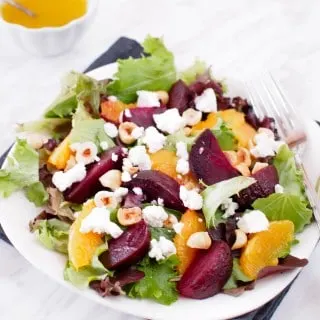 Plate of Roasted Beet and Orange Salad served with Citrus Vinaigrette