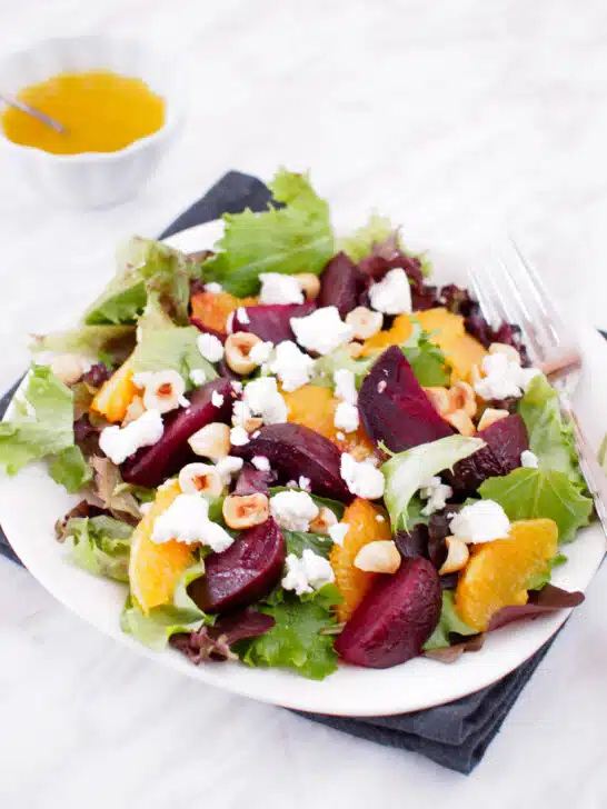 Plate of Roasted Beet and Orange Salad served with Citrus Vinaigrette