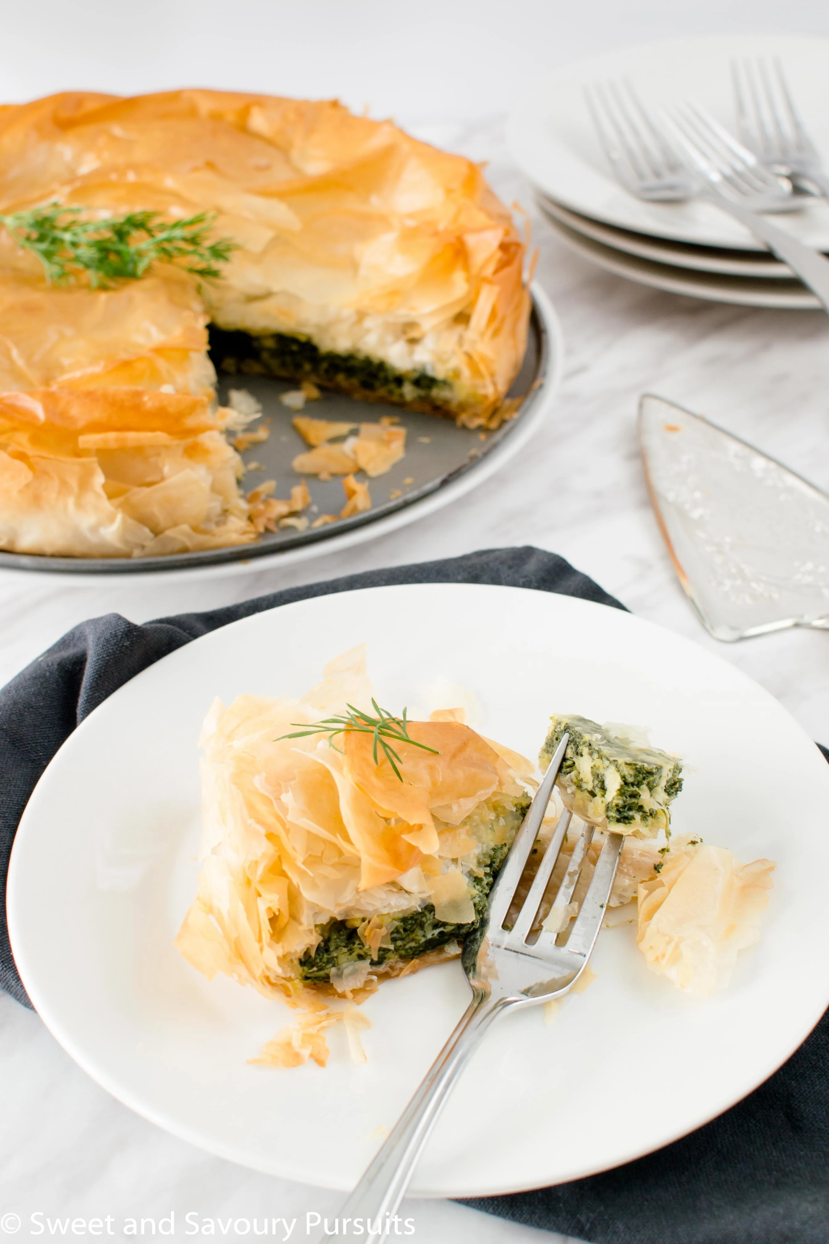 Close-up of a slice of Greek spinach pie.