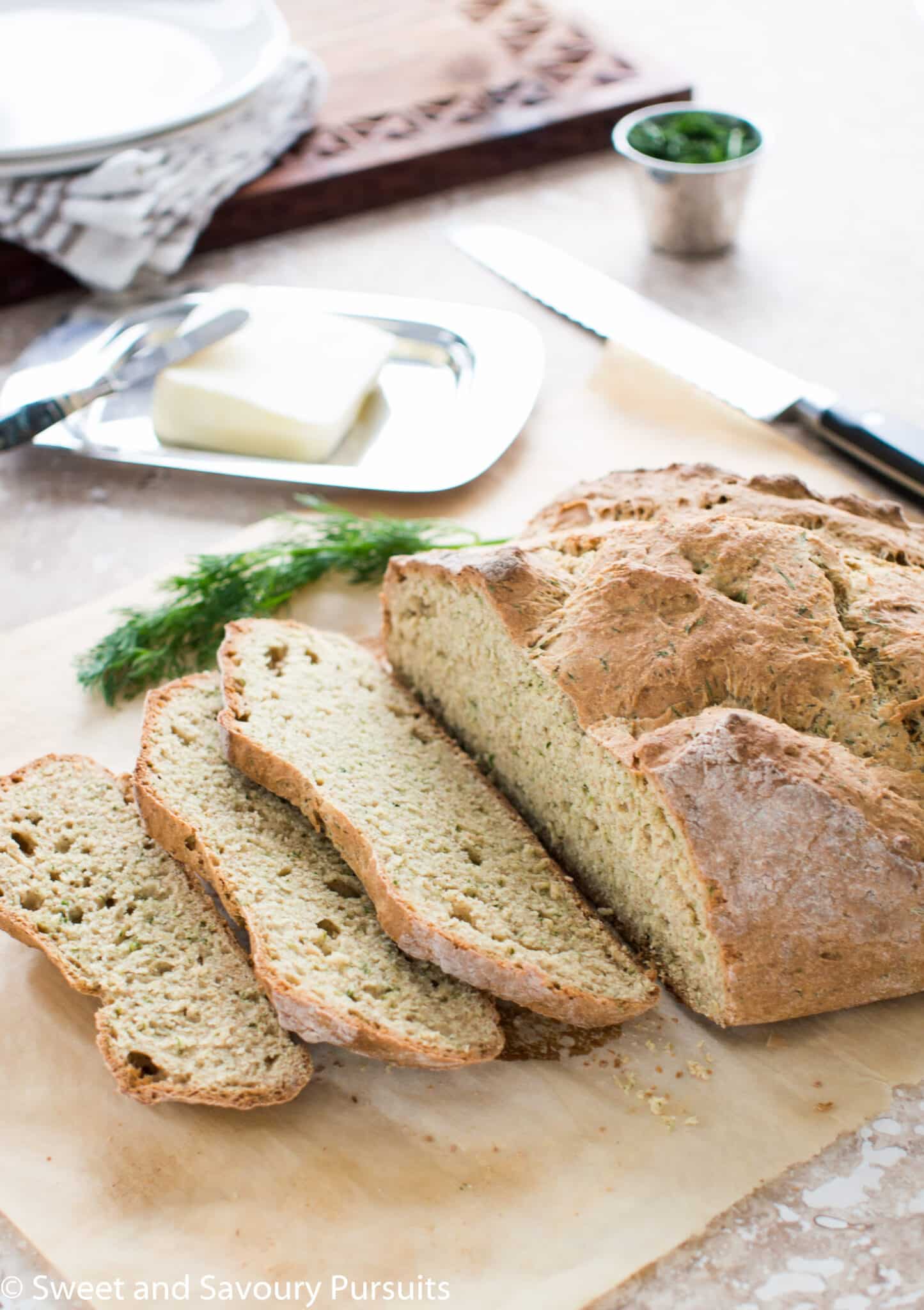 Sliced Irish Soda Bread with Dill on board.