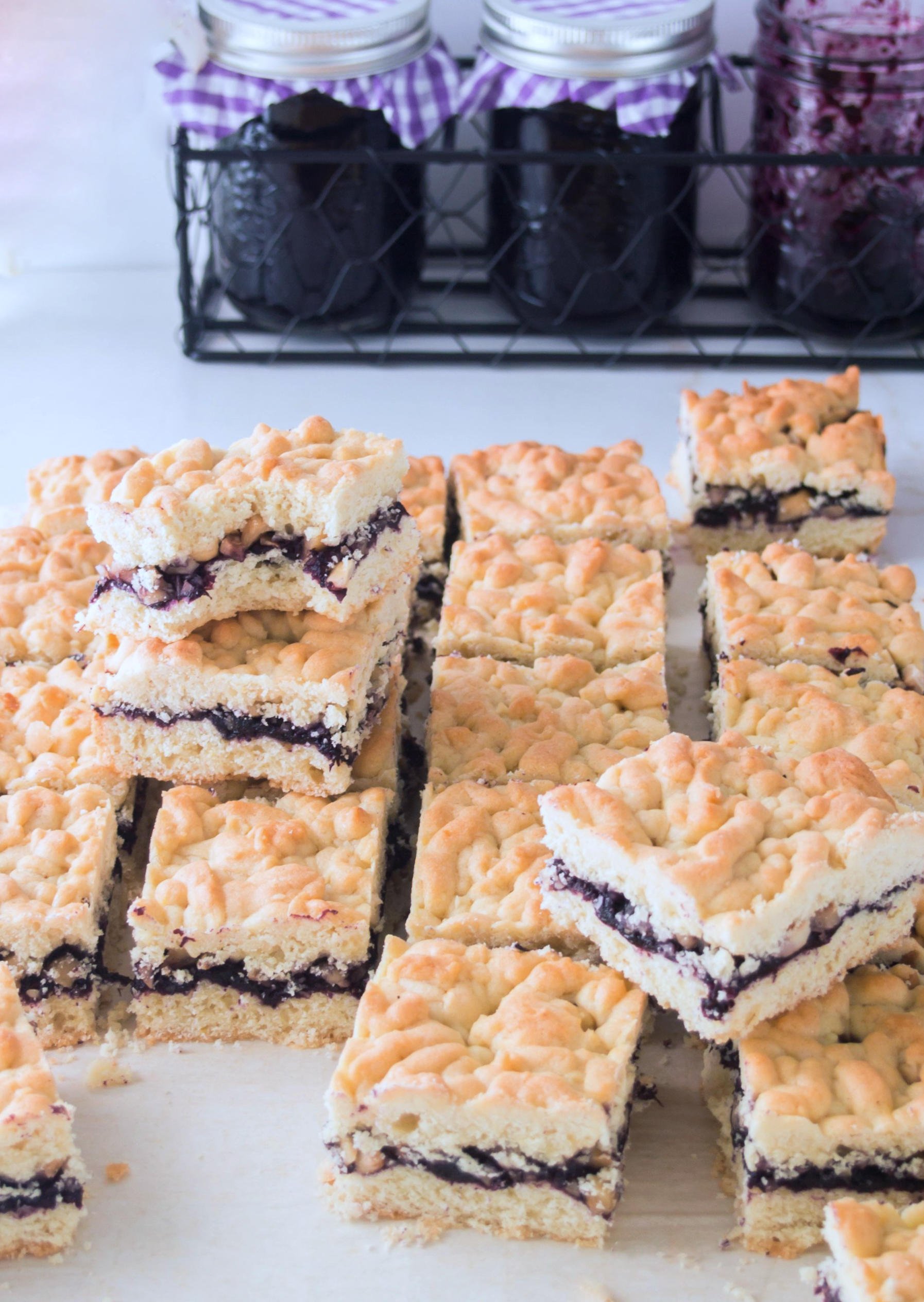 Sliced Blueberry Jam and Hazelnut Bars on board.