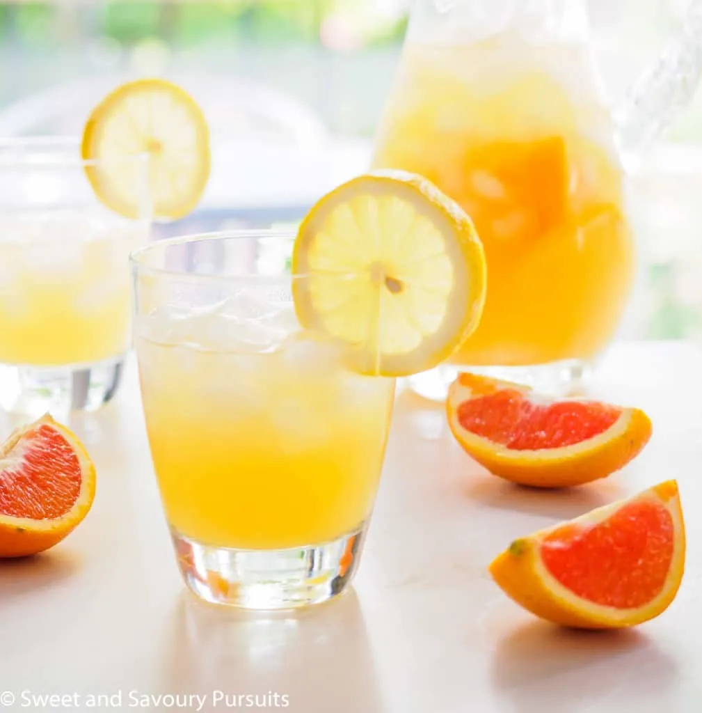 Glass of citrus drink.