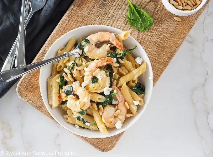 Top view of shrimp and goat cheese pasta dish.