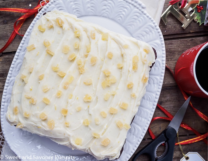 Gingerbread cake topped with cream cheese frosting and crystallized ginger.