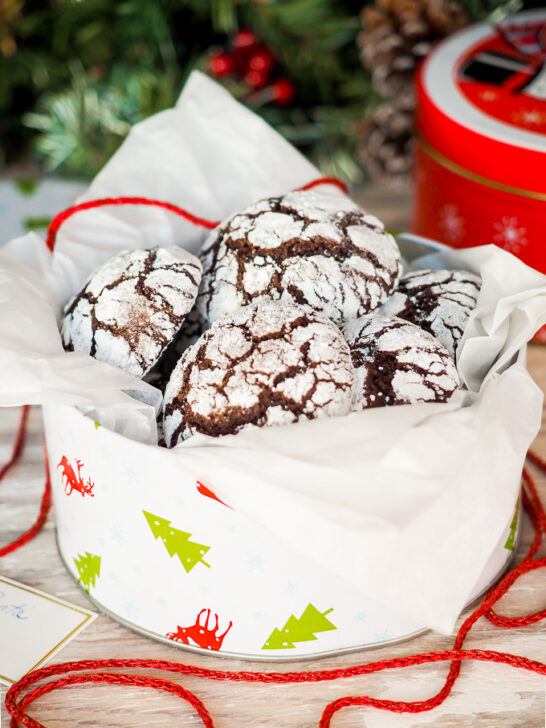 Chocolate Crinkle Cookies in cookie tin.