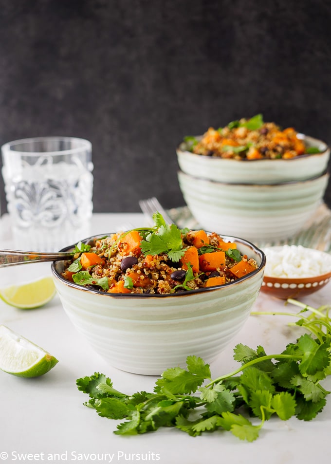 Sweet Potato and Black Bean Quinoa bowl topped with fresh cilantro.