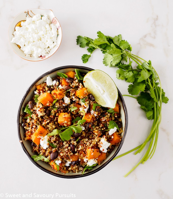 Bowl of quinoa with sweet potato and black beans.