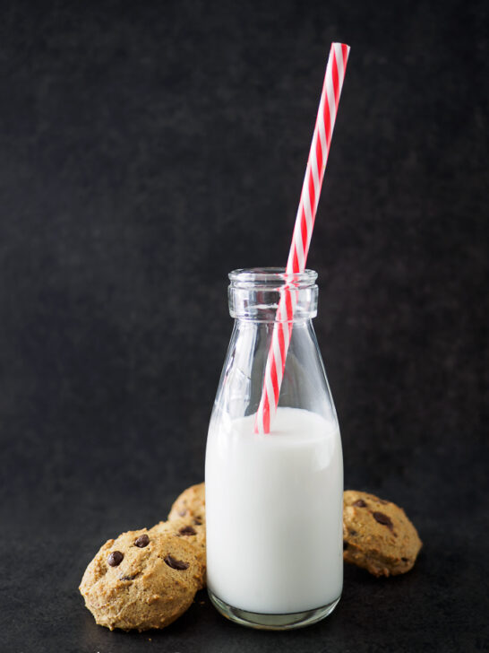 Chickpea Chocolate Chip Cookies with a bottle of milk.