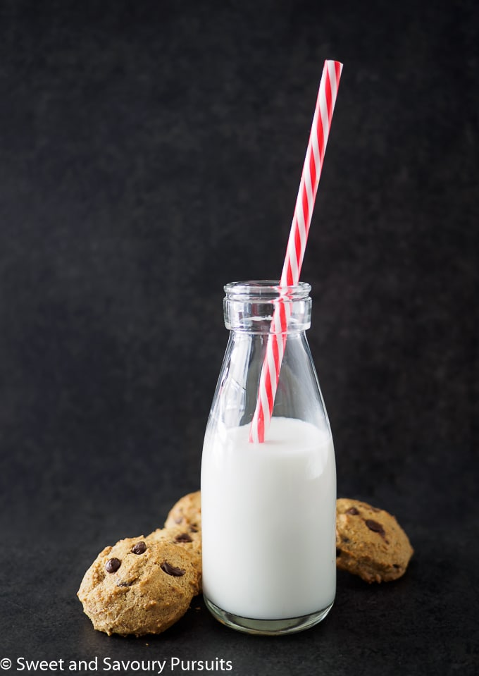 Chickpea Chocolate Chip Cookies with a bottle of milk.