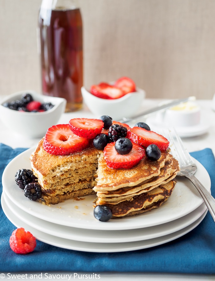 A plate of pancakes made with whole wheat and quinoa flour.