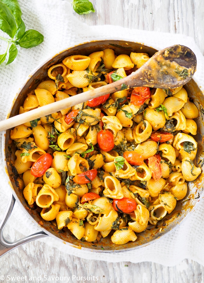 A prepared Creamy Tomato and Spinach Pasta still in large skillet.