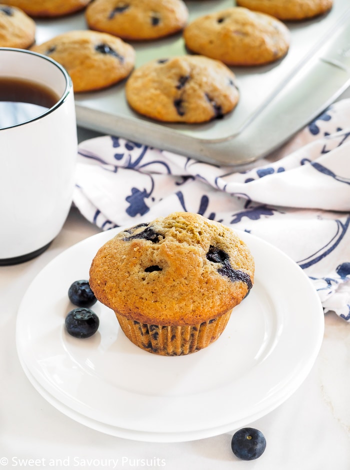 Whole Wheat Blueberry Lemon Muffin served with a cup of coffee