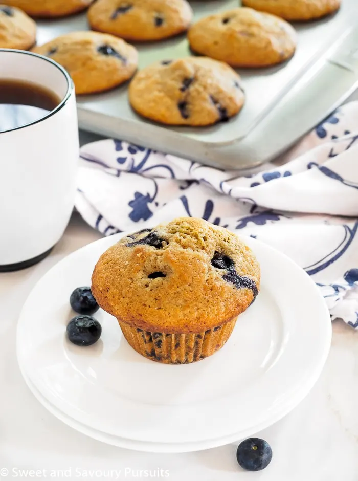 Whole Wheat Blueberry Lemon Muffin served with a cup of coffee