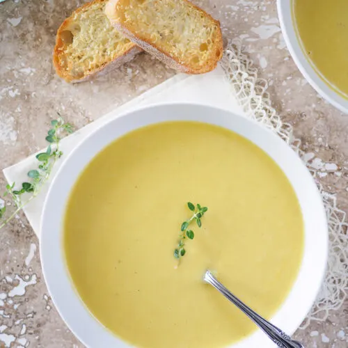 Top view of a bowl of Creamy Leek and Potato Soup.