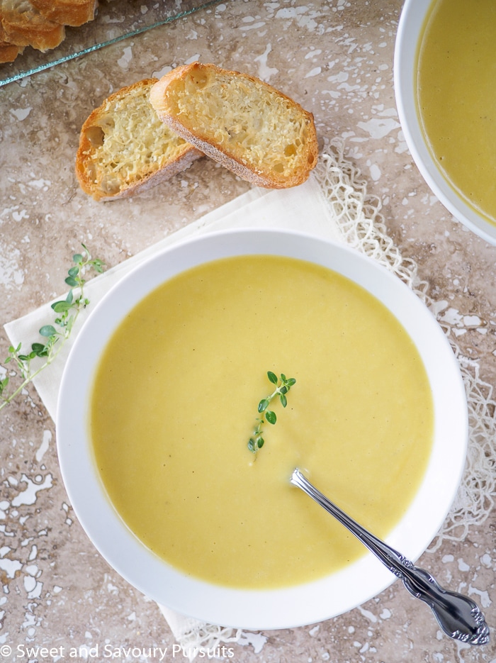 Top view of a bowl of Creamy Leek and Potato Soup.