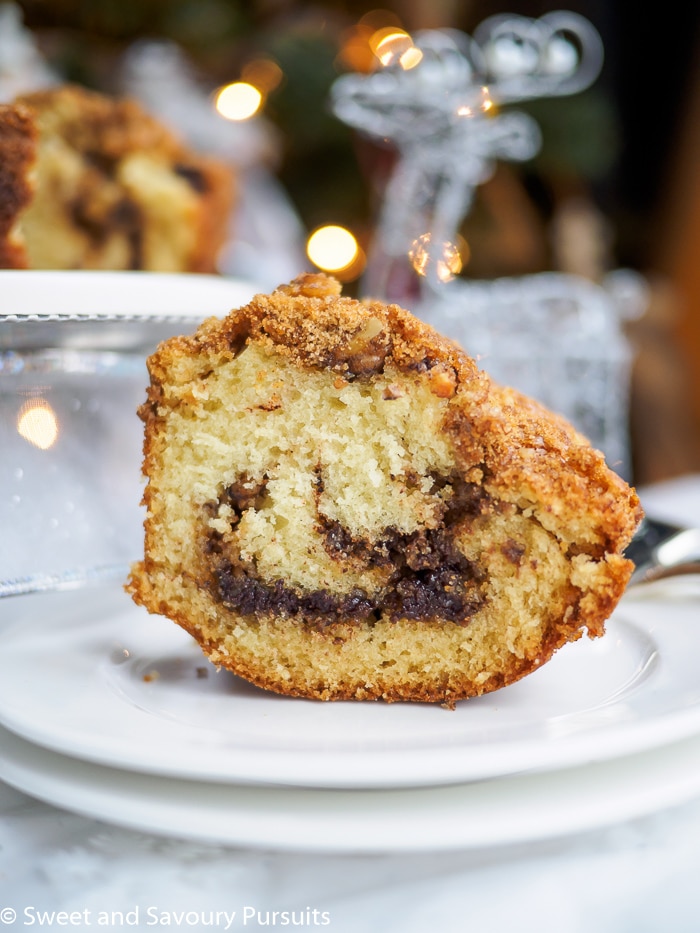 Slice of cinnamon bundt cake on plate.