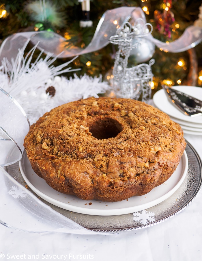 Cinnamon swirl bundt cake on platter.