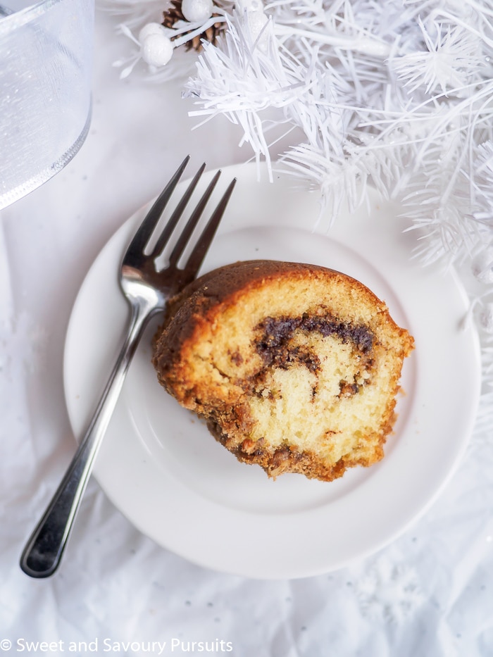 Slice of Cinnamon Swirl Cake on small white plate.