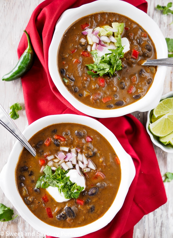 Two bowls of black bean soup.