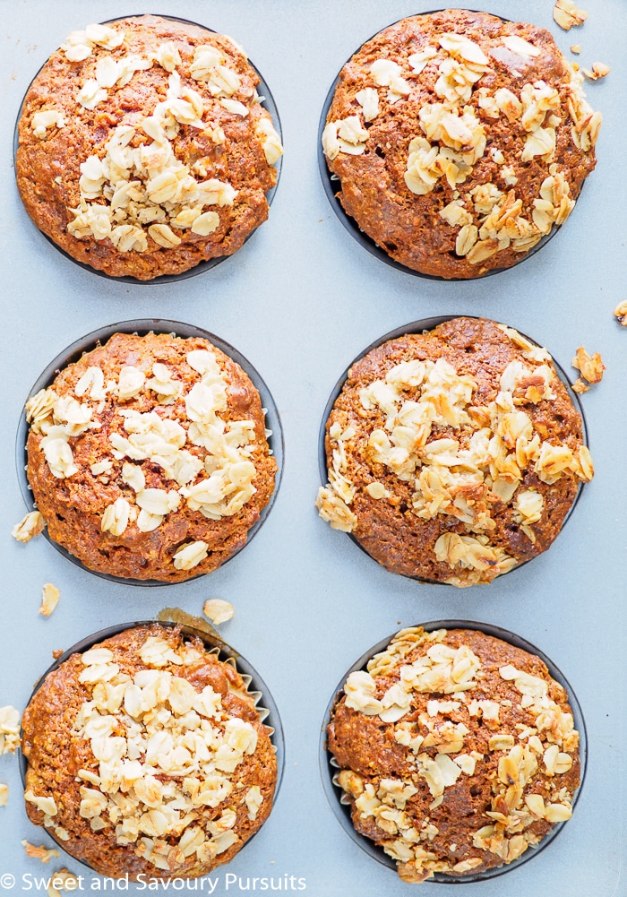 Baked Whole Wheat Carrot Muffins  in muffin pan.