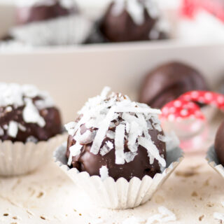Chocolate Coconut Almond Truffles in foil candy cups.