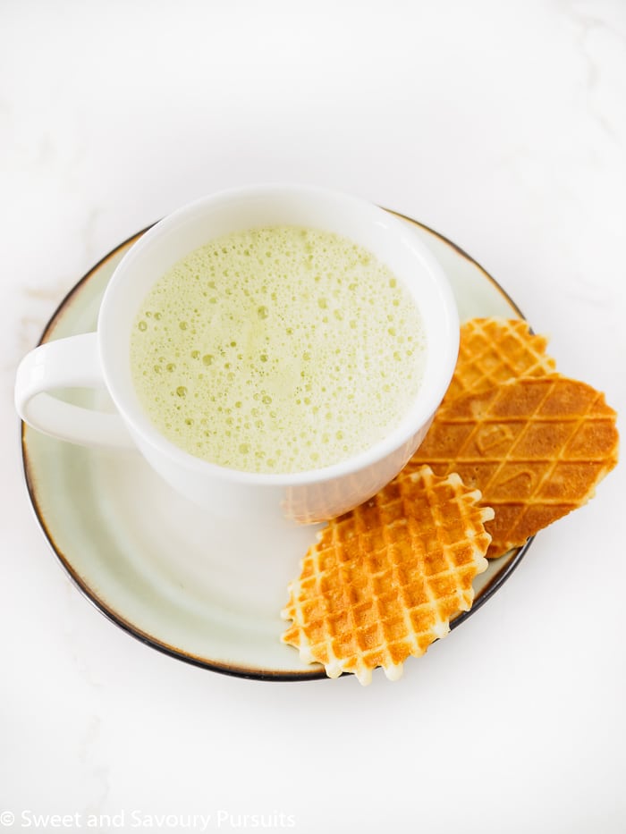 A foamy mug of Matcha Green Tea Latte.