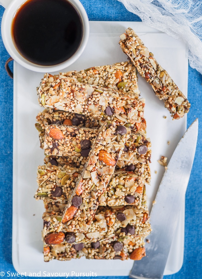 Homemade Coconut and Seed Bars on cutting board.