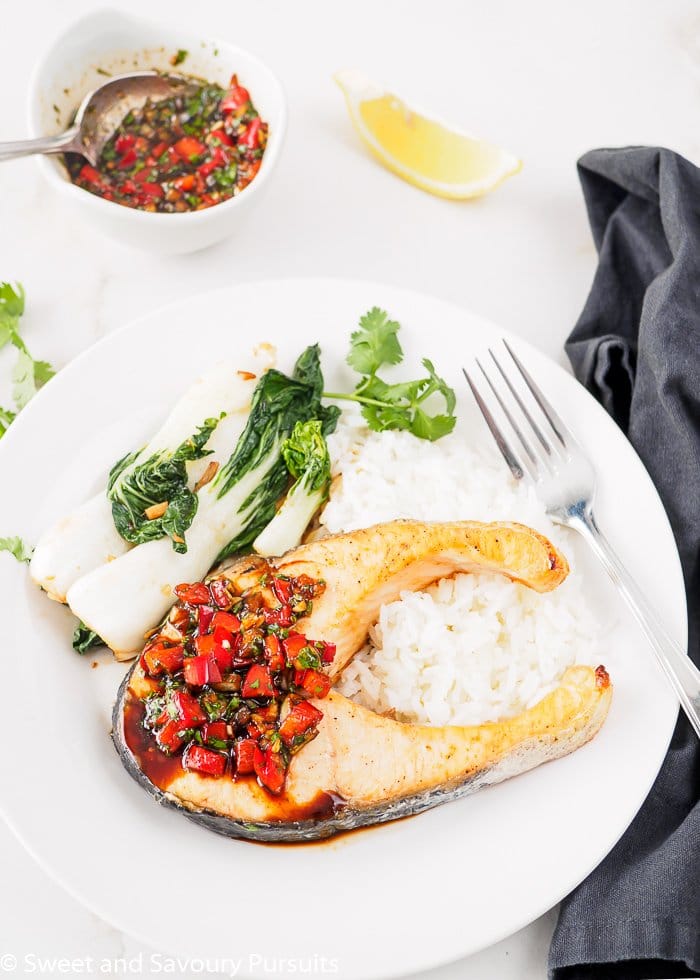 Plate of Thai Baked Salmon with Cilantro-Chili Sauce.