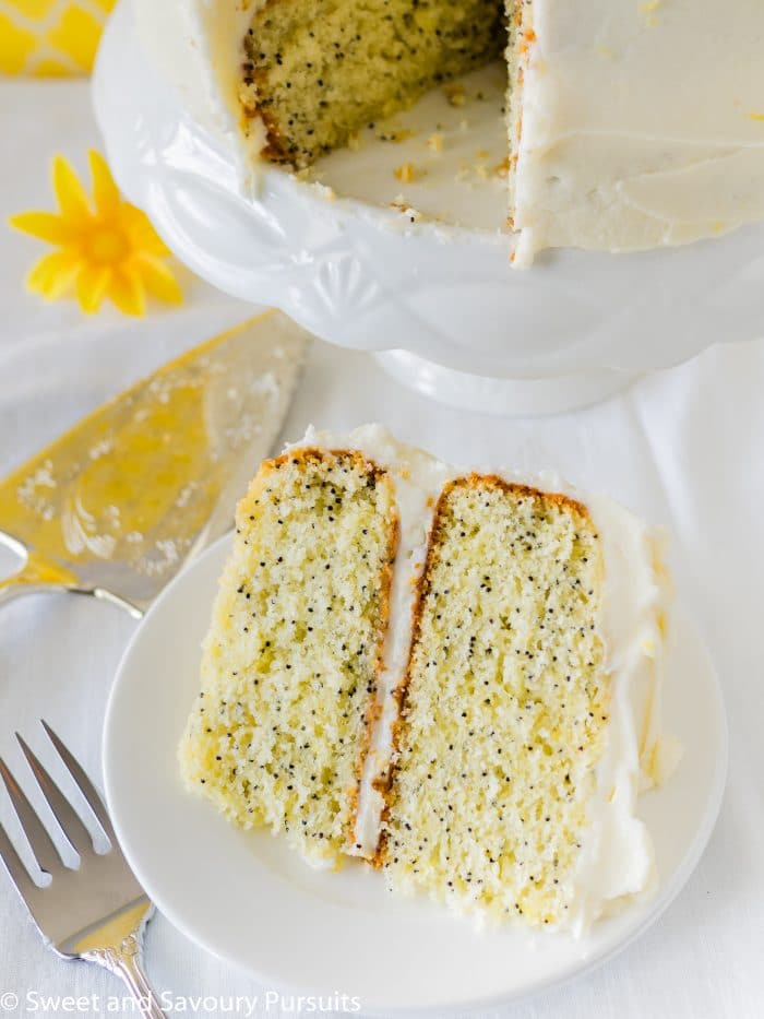 Slice of lemon poppy seed cake on plate. 