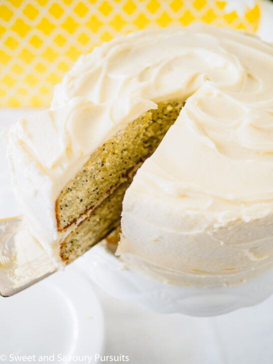 A close-up of a lemon flavoured cake with cream cheese frosting