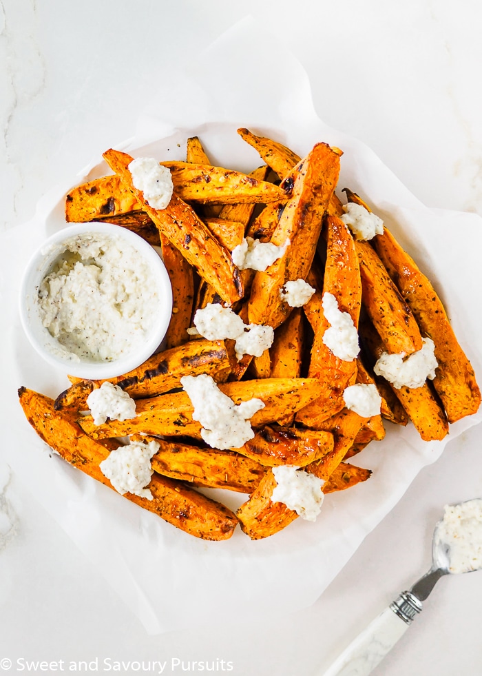 Baked Sweet Potato wedges topped with softened Feta cheese.