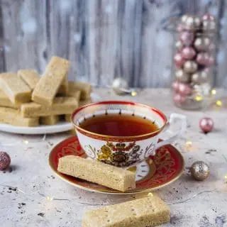 Espresso Cardamom Shortbread Cookies served with a cup of tea.