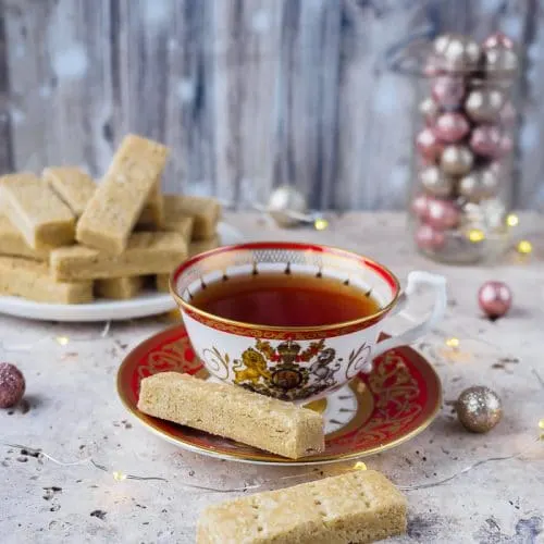 Espresso Cardamom Shortbread Cookies served with a cup of tea.