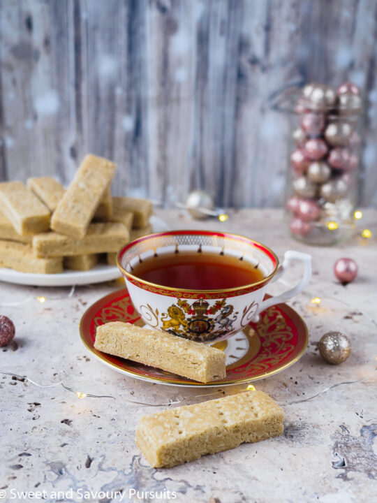 Espresso Cardamom Shortbread Cookies served with a cup of tea.